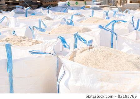 Bags with bulk construction materials outdoors Bags with bulk construction materials outdoors 82183769