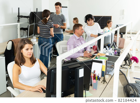 female freelancer concentrated on work with computer 82184424