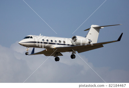 Light private jet comes in for a landing Light private jet comes in for a landing 82184467