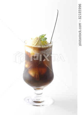 Photographed coffee float with vanilla ice cream melting on a white background 82185996