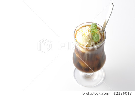 Photographed coffee float with vanilla ice cream melting on a white background 82186018
