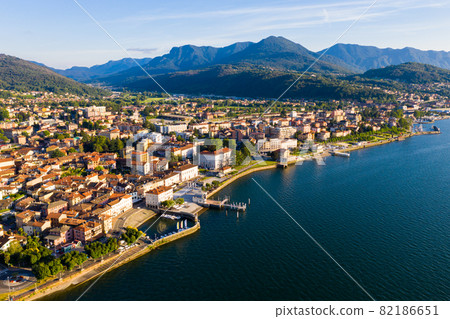 Aerial view of Luino, is small town on the shore of Lake Maggiore in province of Varese Aerial view of Luino, is small town on the shore of Lake Maggiore in province of Varese 82186651