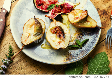 Baked pear with figs Baked pear with figs 82187764