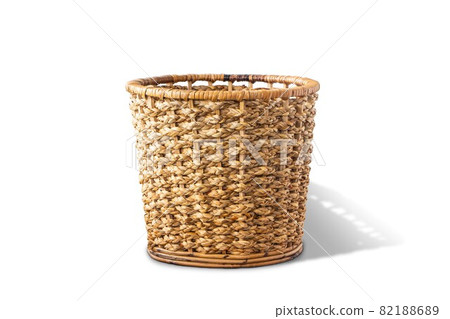 Empty wicker basket isolated on a white background with clipping path. Front view. Water hyacinth basket. Empty wicker basket isolated on a white background with clipping path. Front view. Water hyacinth basket. 82188689