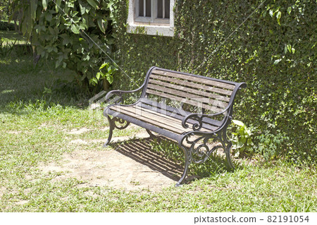 Wooden chaise lounge for sitting in the garden Wooden chaise lounge for sitting in the garden 82191054