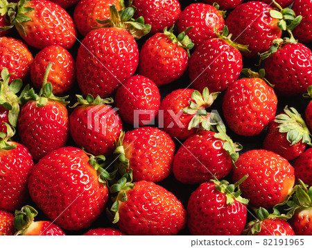 A lot of red ripe and fresh strawberries. Closeup 82191965