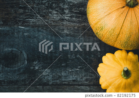 Pumpkin and peter pan squash on wood 82192175