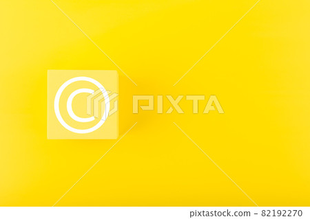 Minimal yellow copyright protection concept on yellow background with copy space 82192270