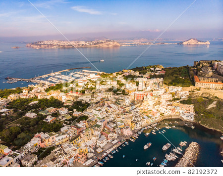 Aerial drone view of Italian island Procida. Marina Corricella and fort Aerial drone view of Italian island Procida. Marina Corricella and fort 82192372