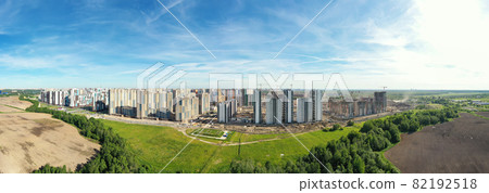 Ready houses and building construction site. City development. Aerial view Ready houses and building construction site. City development. Aerial view 82192518