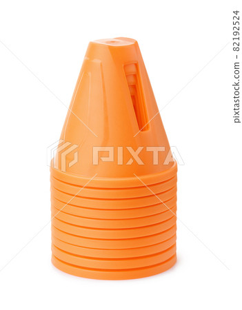 Stack of orange plastic safety traffic cone Stack of orange plastic safety traffic cone 82192524