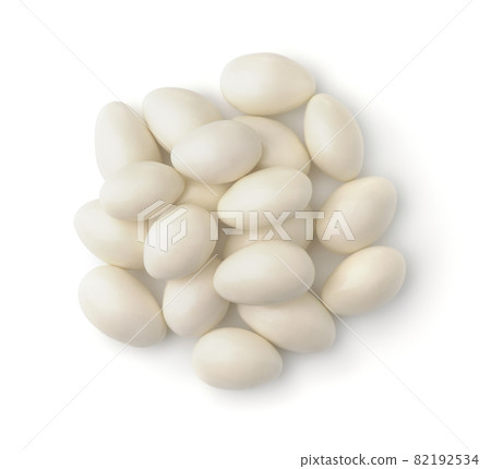 Top view of white chocolate covered nuts Top view of white chocolate covered nuts 82192534