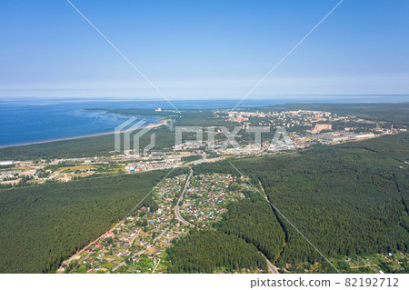 Smoking cooling towers at nuclear power plant. Aerial view Smoking cooling towers at nuclear power plant. Aerial view 82192712