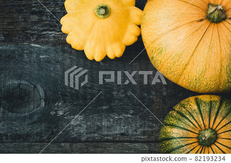 Pumpkin and peter pan squash on wood Pumpkin and peter pan squash on wood 82193234