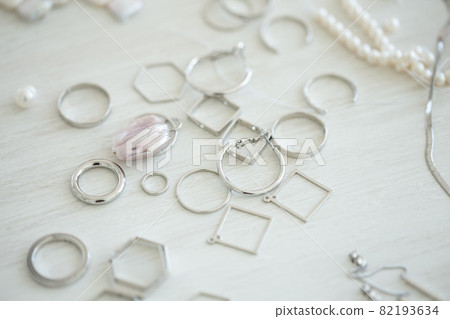 A set of accessories and tools for making jewelry. Needlework and hand made. A set of accessories and tools for making jewelry. Needlework and hand made. 82193634
