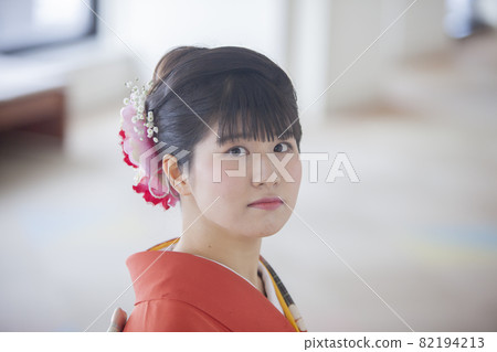 A woman wearing furisode at a coming-of-age ceremony A woman wearing furisode at a coming-of-age ceremony 82194213