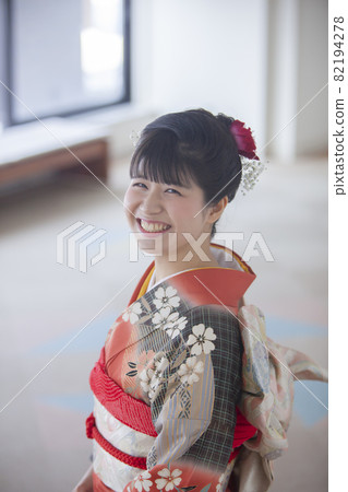 A woman wearing furisode at a coming-of-age ceremony A woman wearing furisode at a coming-of-age ceremony 82194278
