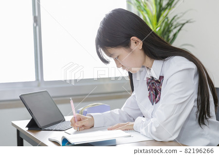 School girls studying 82196266