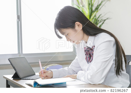 School girls studying 82196267