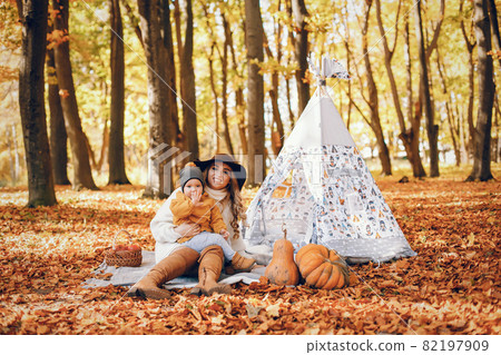 Beautiful and stylish family in a park 82197909