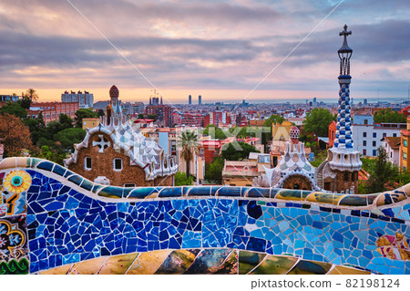 Barcelona city view from Guell Park. Sunrise view of colorful mosaic building in Park Guell 82198124