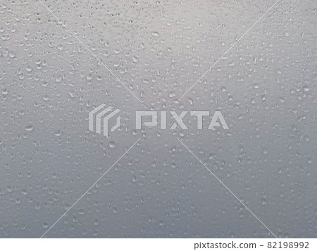 Water drop texture on the glass surface Water drop texture on the glass surface 82198992