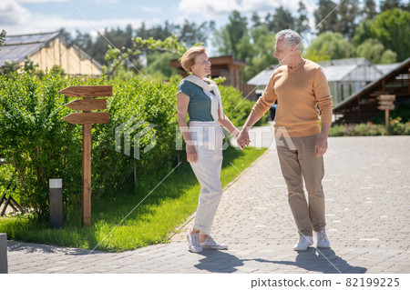 Romantic couple enjoying each other society during the morning walk 82199225
