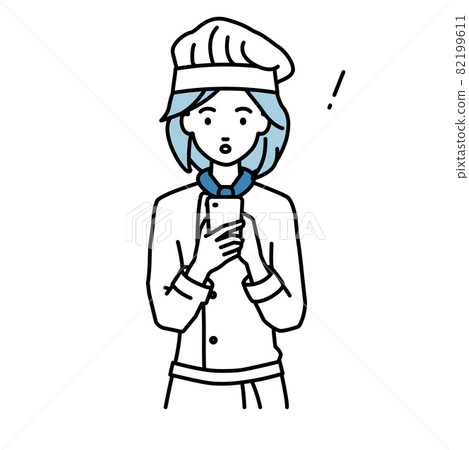 一位女廚師在站立和操作智能手機時驚訝地發現了什麼 82199611