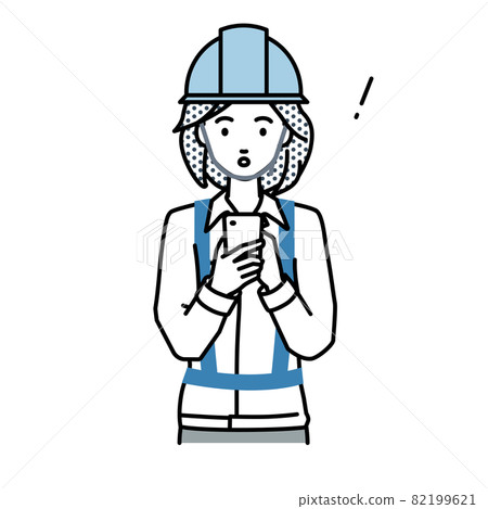 一位在建築工地工作的女士,在站立和操作智能手機時驚訝地發現了什麼 一位在建築工地工作的女士,在站立和操作智能手機時驚訝地發現了什麼 82199621