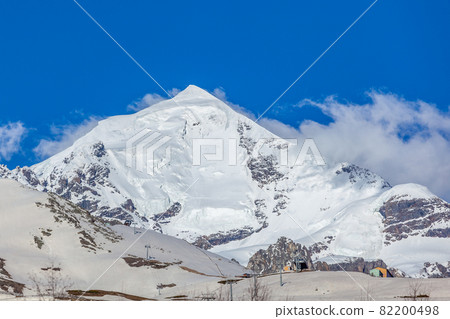 Mount Tetnuldi rises above the Great Caucasian Range in the upper Svaneti. Georgia 82200498