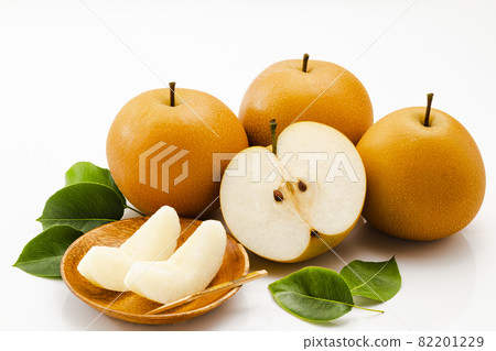 Pear with leaves on a white background 82201229