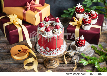 Christmas holiday cake decorated with sweet balls and snowflakes 82203873