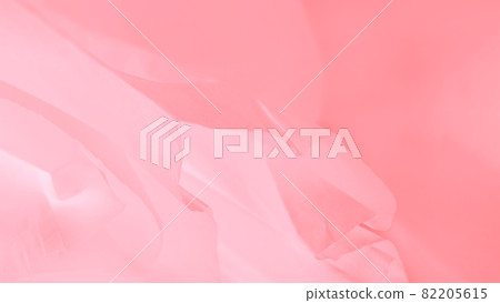 Pink coral color flying satin texture, 16 on 9 abstract blurred background 82205615