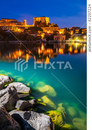 Nightview of the village of Capodimonte on the Bolsena Lake 82207224