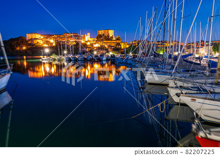 Nightview of the village of Capodimonte on the Bolsena Lake 82207225