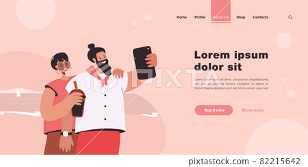 Happy couple taking photo with phone on beach 82215642