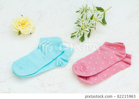 Two pair of women's socks on white background. Two pair of women's socks on white background. 82215963