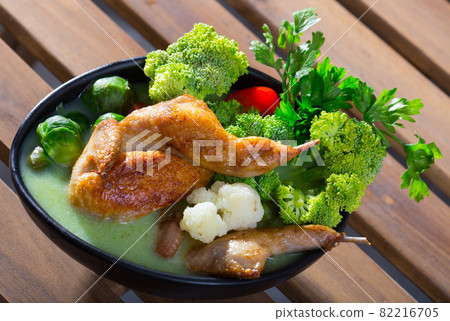 Tasty soup with quail, brussels sprouts, broccoli, and cauliflower Tasty soup with quail, brussels sprouts, broccoli, and cauliflower 82216705
