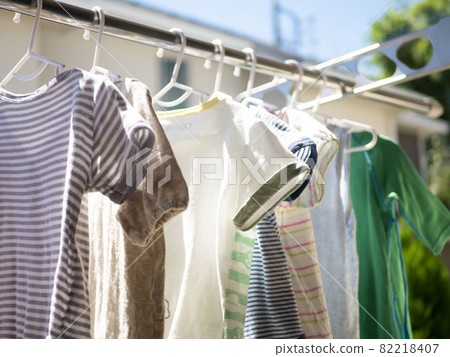 Image of drying children's clothes outside 82218407