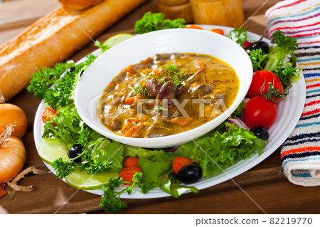 Goulash with chicken hearts and vegetables Goulash with chicken hearts and vegetables 82219770