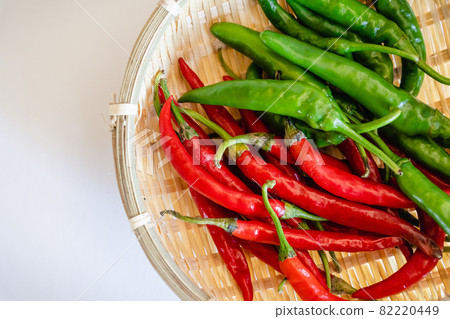 Fresh green and red peppers Fresh green and red peppers 82220449
