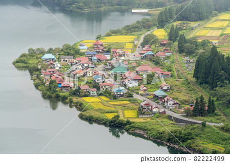 Tadami Line train with Tadami Village in the morning mist, Kaneyama Town, Fukushima Prefecture 82222499