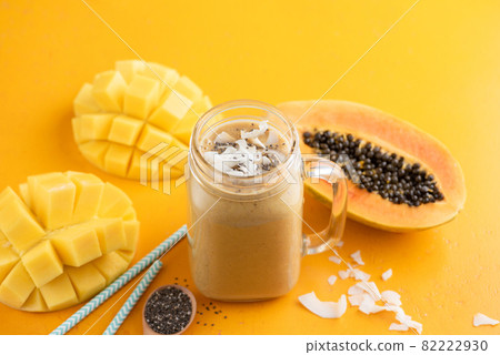 Tropical mango papaya coconut smoothie Tropical mango papaya coconut smoothie 82222930