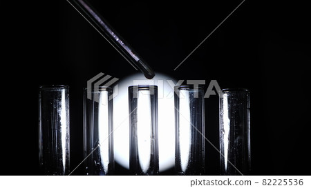 Add the drug to test tubes, close-up of laboratory equipment 82225536