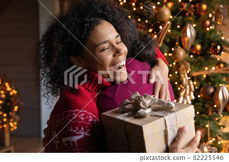 Overjoyed biracial couple celebrate New Year together 82225546