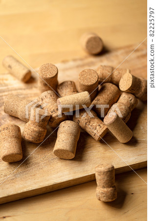 Bunch of wine corks on wooden table 82225797