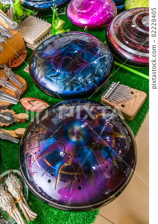 Exhibition and sale of unusual musical instruments - tank drum or glucophone. 82228405