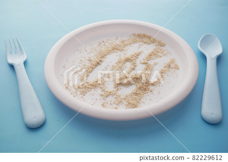Empty plate after eating on table Empty plate after eating on table 82229612