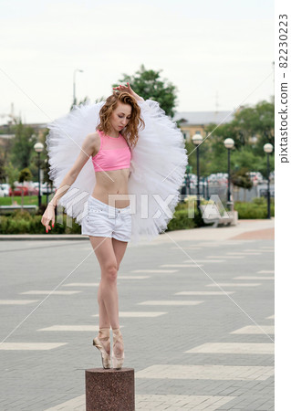 Ballet dancer dancing on street Ballet dancer dancing on street 82230223