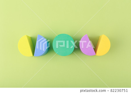 Trendy creative composition with multicolored circles against light green background 82230751